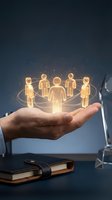 Male professional hand holding glowing connected network of people figures with orbital lines, representing global communication, teamwork, and business collaboration on dark background.