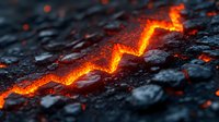 Glowing hot lava crack in dark volcanic rock formation creates dramatic zigzag pattern with intense orange magma light and cooling black stone surface.