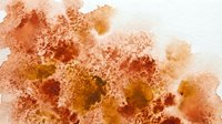 Abstract watercolor texture in warm autumn tones with organic splashes and granular effects for creative design projects and artistic backgrounds.