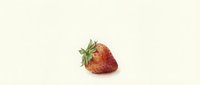 Fresh ripe strawberry with green leaves isolated on white background for healthy eating and organic food concepts.
