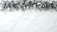 Festive winter garland with frosted pinecones, evergreen branches, and berries arranged on marble surface for holiday design projects.