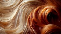 Abstract flowing curves of blonde and copper hair strands creating elegant waves and swirls against dark background.