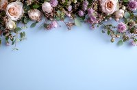 Delicate pink roses and lilac flowers create an elegant border arch on light blue background, with green foliage adding natural flow. Perfect for wedding stationery.