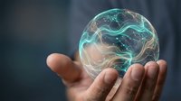 Hand holding glowing digital brain with neural networks and connections representing artificial intelligence and machine learning technology concepts.