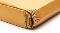 Damaged brown cardboard shipping box with torn corner showing corrugated layers, isolated on white background for packaging and delivery concepts.