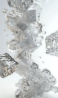 Clear ice cubes falling in water with air bubbles and splashes creating dynamic motion against light background, suitable for beverage advertising.