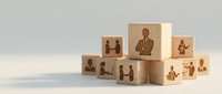Wooden blocks with business icons representing teamwork, leadership and corporate strategy concepts for professional development and management training.