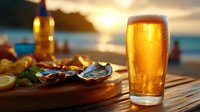 Golden beer glass with condensation on wooden table at sunset beach with fresh oysters and lemon, perfect for summer refreshment, seafood dining, and vacation lifestyle content.