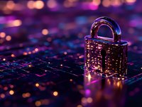 Metal padlock on computer keyboard with purple and pink bokeh lights, representing cybersecurity, data protection and digital privacy in modern technology.