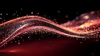 Glowing red and gold particles form dynamic flowing waves against dark background, creating magical light trails with sparkling dust effect and bokeh elements.