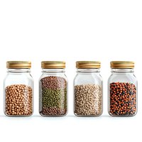 Assortment of dried legumes and beans in glass storage jars with gold lids on white background, showcasing variety of pulses for healthy cooking.