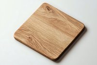 Square wooden cutting board with natural oak grain texture and rounded corners on white background, isolated for kitchen and food photography.