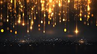 Magical glowing golden lights falling from dark sky over distant city skyline at night, creating dreamy bokeh effect and festive atmosphere.