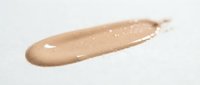 Liquid foundation makeup smear in beige nude tone on white background, cosmetic product texture sample for beauty and skincare applications.
