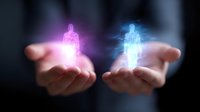 Glowing pink and blue holographic human silhouettes floating above open palms against dark background, representing digital transformation and future technology.