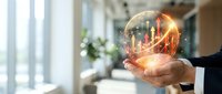 Professional businessman holding glowing sphere with financial growth charts and data analytics in modern office environment for business success concepts.