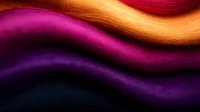 Vibrant wavy lines in purple, magenta, orange and red create dynamic abstract background with smooth gradient transitions and flowing curves. Elegant modern design.