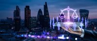 Digital justice concept with glowing scales of law symbol over businessman hand against modern city skyline at twilight for legal technology applications.