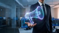 Professional businessman in suit holding glowing digital megaphone hologram in modern office, representing marketing communication and business announcement technology.