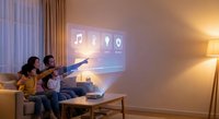 Young diverse family with children enjoying smart home entertainment system with holographic interface display in modern living room during evening.