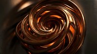 Close-up of swirling molten copper liquid forming hypnotic spiral patterns with warm golden reflections, suitable for abstract backgrounds and design projects.