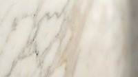 Natural white marble stone texture with elegant gray veining patterns for luxury interior design and architectural backgrounds.