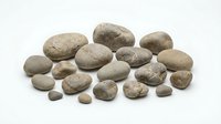 Collection of smooth river rocks and pebbles in natural earth tones isolated on white background for spa, zen garden, landscaping and craft projects.