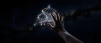 Hand holding glowing neural network brain with connected nodes against dark sky background for artificial intelligence and technology concepts.