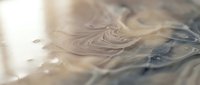 Fresh homemade pasta noodles with flour dusting on wooden surface, artisanal Italian cooking preparation for traditional cuisine and culinary arts.