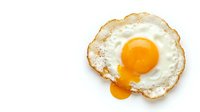 Fried egg with runny yolk isolated on white background for breakfast menu design and culinary projects.