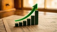 Green arrow pointing upward over rising bar chart on financial newspaper showing business growth and success trends in warm office setting.