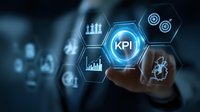 Businessman touching KPI button on virtual screen with performance metrics and business analytics hexagonal icons in blue technology interface.
