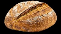Artisan sourdough bread loaf isolated on transparent background, ready for bakery designs, menus, food packaging, print-on-demand products, t-shirt graphics, and culinary clipart applications.