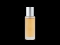 Elegant glass perfume bottle with silver cap and golden liquid, isolated on transparent background, ready for beauty, cosmetic, and product design use.