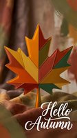 Stylized maple leaf in vibrant autumn colors of orange, red, yellow, and green against a blurred fall foliage background. Seasonal greeting card design for autumn marketing and promotional materials.