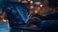 Programmer working on laptop with glowing digital interface and code in dark room with bokeh lights, cybersecurity and software development concept.