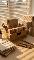 Wooden desk organizer with letter blocks spelling NOISE on bright workspace with venetian blinds casting shadows and office supplies.