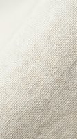 Cream linen fabric with woven texture, suitable for interior design, fashion, textile backgrounds, upholstery projects, and home decor applications.
