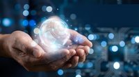 Businessman holding glowing digital globe with blue bokeh lights, representing global connectivity, technology innovation, and worldwide business networks for corporate communications.