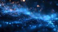 Magical blue glowing particles and bokeh lights on dark background create dreamy atmospheric effect. Abstract defocused sparkles flow in space.