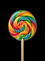 Rainbow swirl lollipop on a stick, isolated on transparent background, ready for t-shirt design, stickers, clipart, print on demand, and sublimation projects.