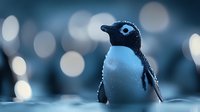 Young penguin chick with fluffy feathers standing against dreamy bokeh lights background. Antarctic wildlife photography for nature and animal themes.