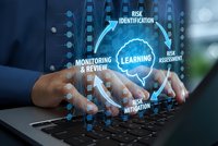 Businessman hands typing on laptop with digital risk management cycle diagram showing learning, assessment, mitigation and monitoring processes.