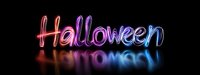 Glowing neon Halloween text with reflection on dark background creates spooky festive atmosphere for holiday designs and promotional materials.