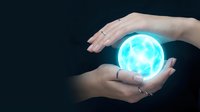 Female hands holding glowing blue sphere against dark background, representing energy, technology, innovation, and future concepts for business and digital design projects.