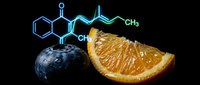 Fresh orange slice and blueberry with vitamin molecular structure on black background for nutrition science education and healthy food concepts.