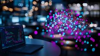 Glowing pink and blue bokeh lights emerging from laptop screen with programming code, creating magical technology atmosphere in dark office space.