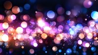 Magical glowing bokeh lights on dark background with pink, purple and blue blurred circles creating dreamy atmospheric effect. Festive holiday backdrop.