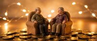 Elderly couple sitting in armchairs surrounded by golden coins and warm bokeh lights creating cozy retirement planning atmosphere.