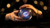 Fortune teller hands holding crystal ball with cosmic galaxy swirl inside against dark background with golden bokeh lights for mystical divination.